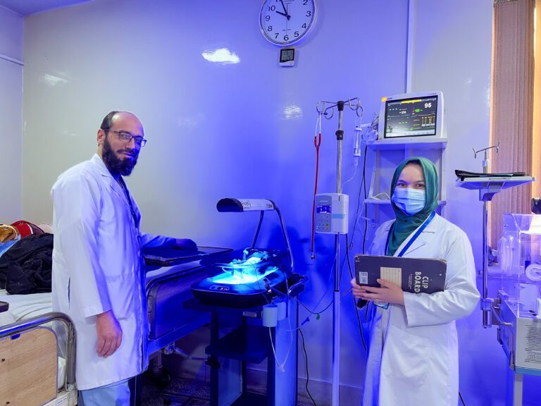 Baby Ali Reza receiving phototherapy and monitored with Afshar Hospital medical staff